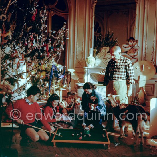 At Christmas with Esmeralda, the goat Pablo Picasso received from Jacqueline. Jacqueline, Claude Picasso with Citroën DS, Paloma Picasso, Catherine Hutin, Gérard Sassier. La Californie, Cannes 1956. - Photo by Edward Quinn