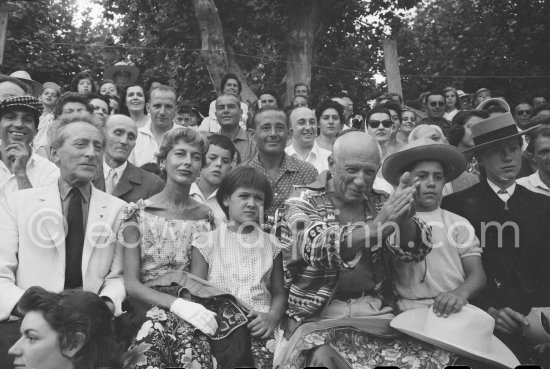 Local Corrida. Jean Cocteau, behind him Javier Vilató and Paul Derigon, the mayor of Vallauris, Francine Weisweiller, Paloma Picasso, Pablo Picasso, Claude Picasso, right French lady bullfighter Pierrette Le Bourdiec. Vallauris 1957. - Photo by Edward Quinn