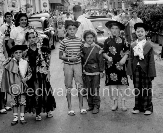 Festivity at Vallauris: Inès Sassier, Picasso\'s housekeeper, Gérard Sassier, Paloma, Catherine ("Cathy") Hutin and Claude. Vallauris 1957. - Photo by Edward Quinn