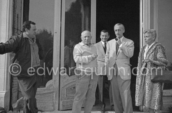 Pablo Picasso with oceanologist Jacques-Yves Cousteau, his wife and unknown visitors. La Californie, Cannes 1958. - Photo by Edward Quinn