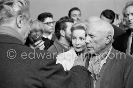 Pablo Picasso and Georges Salles, President of the ICOM. Unveiling of mural "The Fall of Icarus" for the conference hall of UNESCO building in Paris. The mural is made up of forty wooden panels. Initially titled "The Forces of Life and the Spirit Triumphing over Evil", the composition was renamed in 1958 by George Salles, who preferred the current title, "The Fall of Icarus". Vallauris, 29 March 1958. - Photo by Edward Quinn