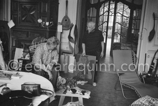 Pablo Picasso showing a linoblock to Edouard Pignon. La Californie, Cannes 1959. - Photo by Edward Quinn