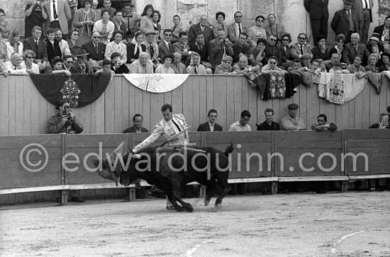 On the grandstand Pablo Picasso, Jacqueline, filming and Catherine Hutin, on the left Paulo Picasso watching Dominguin during a bullfight in Arles 1960. Other photos in the bull ring of this bullfight see "Miscellaneous" - Photo by Edward Quinn