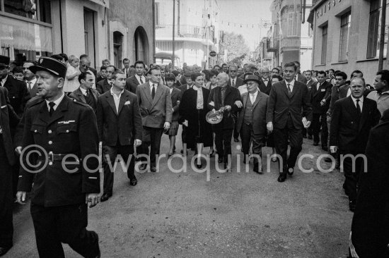 From left: Paloma Picasso, Sabartés, Jacqueline, Cathérine "Cathy" Hutin, Pablo Picasso, French communist party leader Jacques Duclos. Pablo Picasso walks to the bullfight to honor his 80th birthday. Vallauris 29.10.1961. - Photo by Edward Quinn