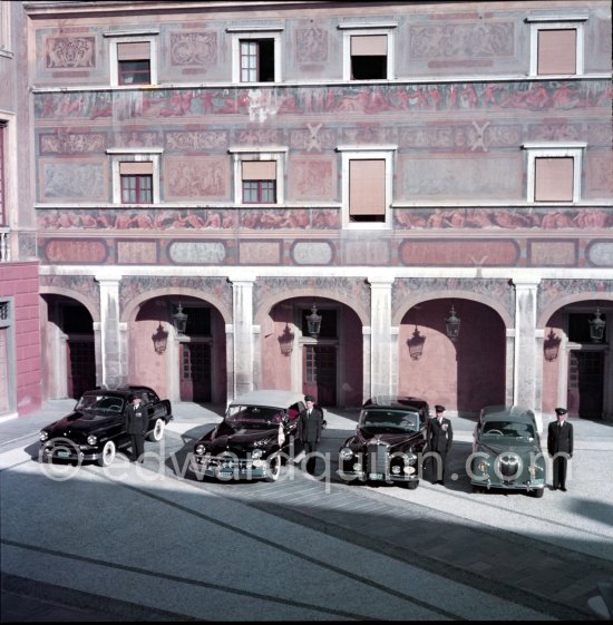 The cars and chauffeurs of Prince Rainier in the court of the Palace. Monaco-Ville 1954. From left:1953 Ford Vedette (Mr. Louche), 1950 Lincoln Cosmopolitan (Mr.Benoit), Mercedes-Benz 300 Limousine (Mr. Raimondo) and Lancia Aurelia B10 Berlina or B21 (RHD) (Mr. Pogliano). - Photo by Edward Quinn