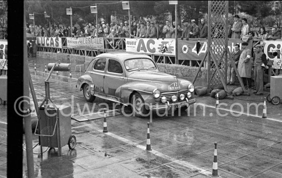 N° 129 Boeswillwald / Renaud on Peugeot 203, undergoing the breaking and starting test. Cars will have to accelerate as fast as possible for 200 metres from a standing start, and then pull up in the shortest possible distance, for the cars have to keep a line between the axles. Rallye Monte Carlo 1951. - Photo by Edward Quinn