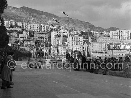 N° 114 Louis Chiron / N. Mahé on Delahaye taking part in the regularity speed test on the circuit of the Monaco Grand Prix. Rallye Monte Carlo 1951. - Photo by Edward Quinn