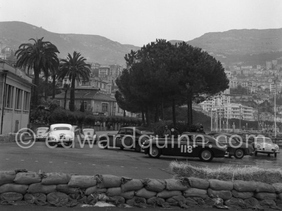 N° 118 Faulkner / Silverthorne on Aston Martin DB2-4, N° 90 Appleyard / Appleyard on Jaguar Mk VII, N° 112 Vard / Jolley on Jaguar MK VII. and 3 Porsche 356 taking part in the regularity speed test on the circuit of the Monaco Grand Prix. Rallye Monte Carlo 1955. - Photo by Edward Quinn