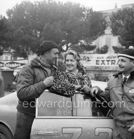 Louis Chiron and his wife. On the right his co-driver Gino Longo N° 32 Lancia Aurélia GT, 1st in Cat. 2, Classe 1. Monte Carlo Rally 1956. - Photo by Edward Quinn