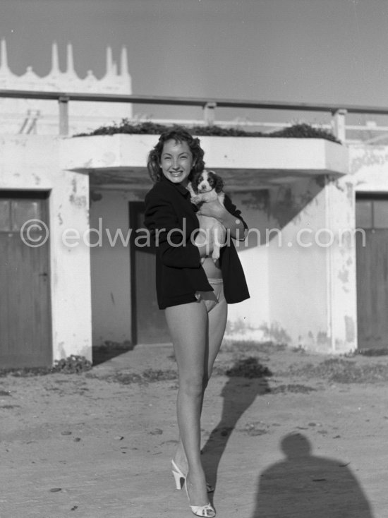 Claude Renault, Miss France 1950, and her shy puppy. Antibes 1951 ...