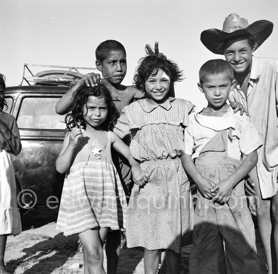 Gypsies on the occasion of the yearly pilgrimage and festival of the Gypsies in honor of Saint Sara, Saintes-Maries-de-la-Mer in 1953. - Photo by Edward Quinn