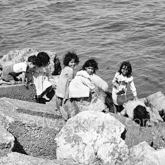 Gypsies on the occasion of the yearly pilgrimage and festival of the Gypsies in honor of Saint Sara, Saintes-Maries-de-la-Mer in 1953. - Photo by Edward Quinn