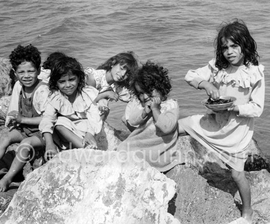 Gypsies on the occasion of the yearly pilgrimage and festival of the Gypsies in honor of Saint Sara, Saintes-Maries-de-la-Mer in 1953. - Photo by Edward Quinn