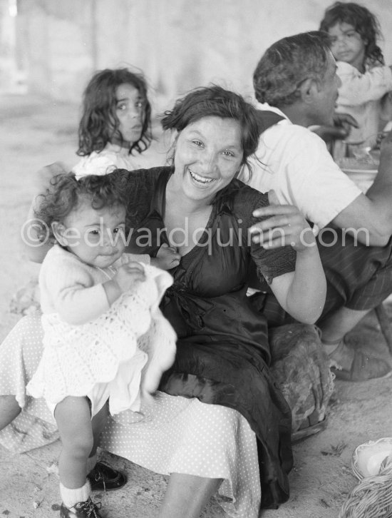 Gypsies on the occasion of the yearly pilgrimage and festival of the Gypsies in honor of Saint Sara, Saintes-Maries-de-la-Mer in 1953. - Photo by Edward Quinn