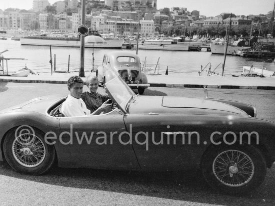 Jean Seberg and Geoffrey Horne, young British actor, during filming of "Bonjour Tristesse". Cannes 1957. Cars: 1953-55 Austin-Healey 100-4. In the background 1951-60 Renault Frégate, Renault 4CV - Photo by Edward Quinn