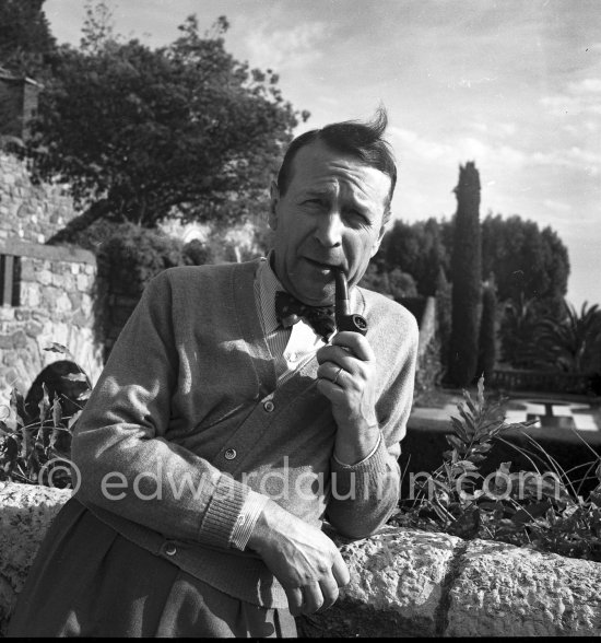 George Simenon at his Villa Golden Gate. Cannes 1955. - Photo by Edward Quinn