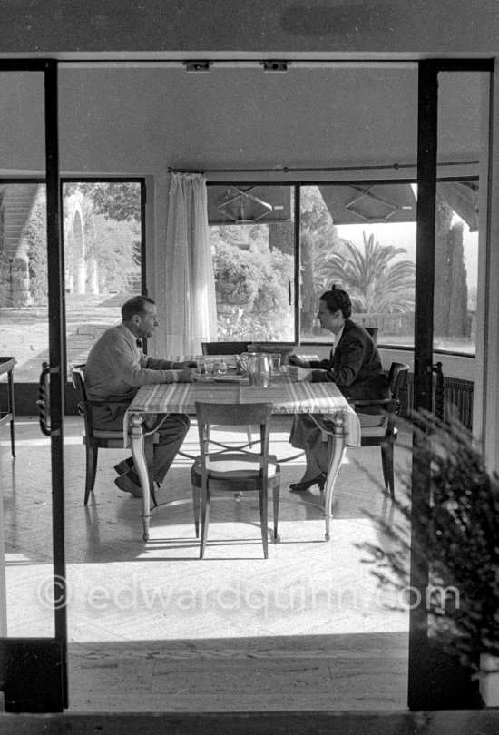 George Simenon and his wife at his Villa Golden Gate. Cannes 1955. - Photo by Edward Quinn