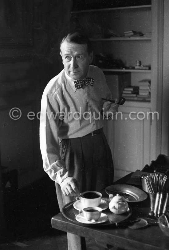 George Simenon at his Villa Golden Gate. Cannes 1955. - Photo by Edward Quinn