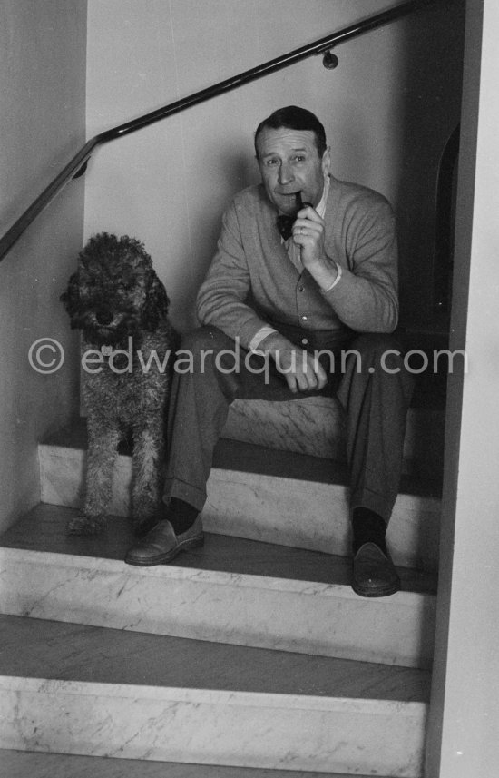 George Simenon at his Villa Golden Gate. Cannes 1955. - Photo by Edward Quinn