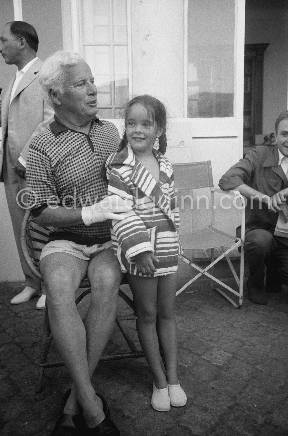 Charlie Chaplin with his daughter Victoria. Chaplin was in Cannes to ...