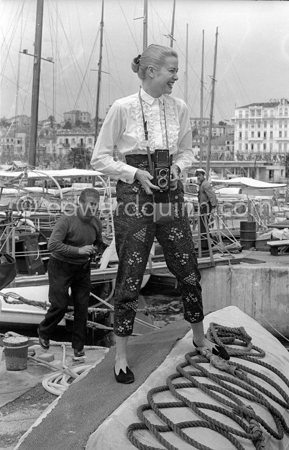 Grace Kelly with her Rolleiflex. Cannes Film Festival. Cannes harbor ...