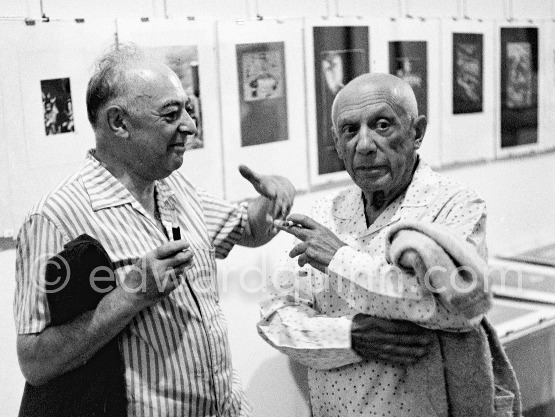 Pablo Picasso and r Brassaï at the opening of the exhibition 