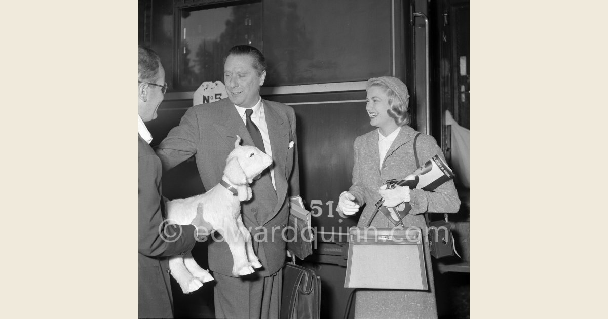 Edward Quinn - Grace Kelly arriving at Cannes Station (with