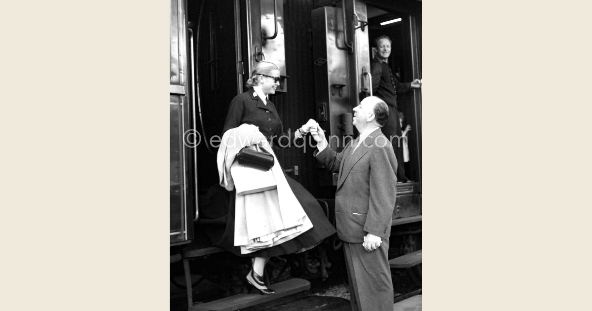 Edward Quinn - Grace Kelly arriving at Cannes Station (with