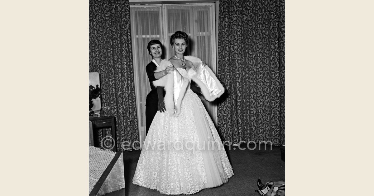 Sophia Loren In Her Carlton Hotel Room During The Cannes Film Festival Wearing An Evening Gown 