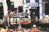 Dirk Bogarde, British leading actor of Dutch descent, at the market. Grasse 1980. - Photo by Edward Quinn