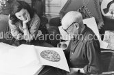 Pablo Picasso and Jacqueline viewing a book about Bernard Palissy, French potter of the 16th century. La Californie, Cannes 1957. - Photo by Edward Quinn